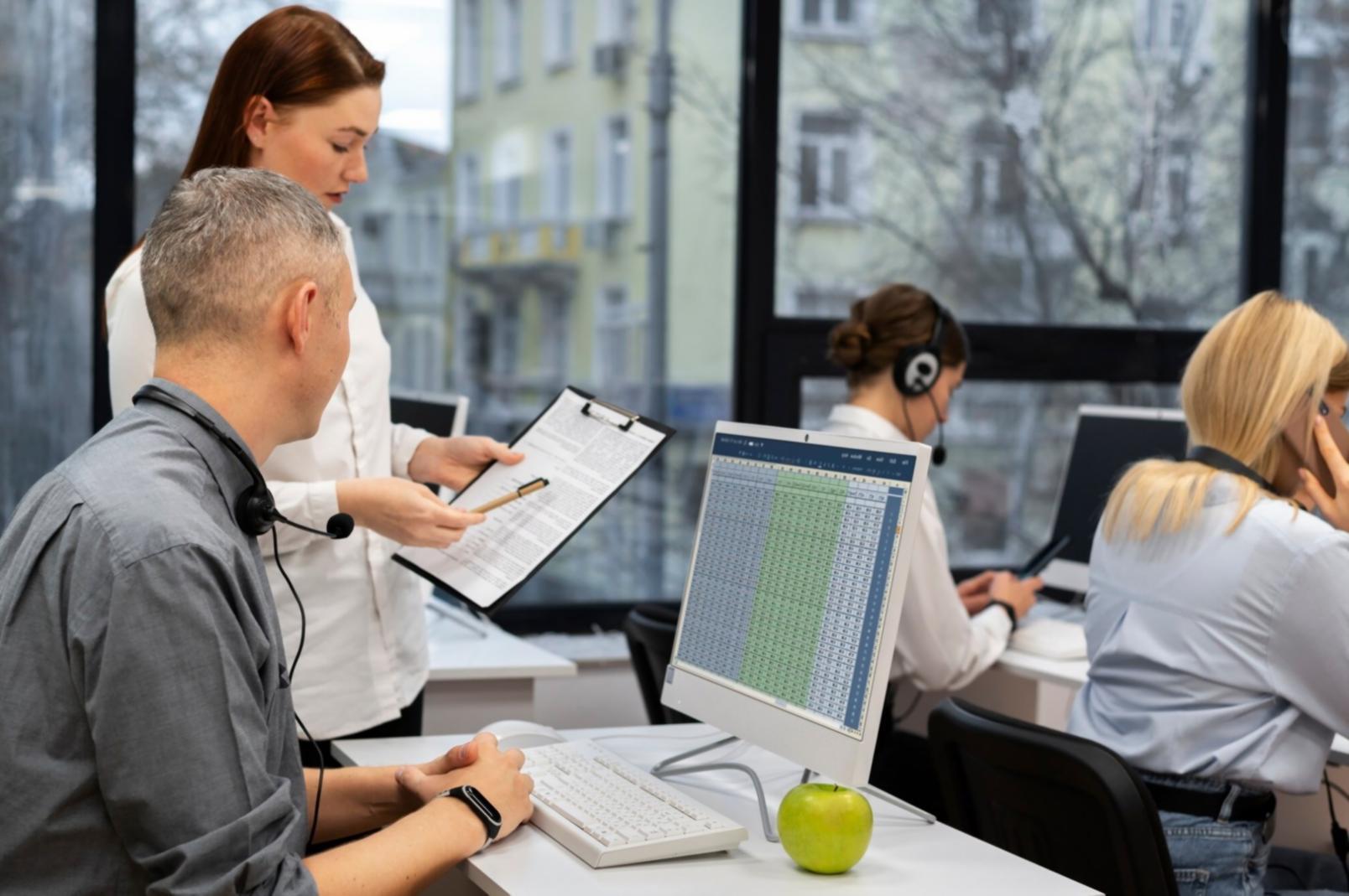 Modern office space with financial planning materials and technology